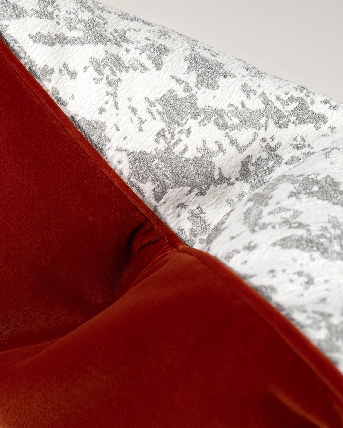 Arcie Tangelo cushion in white, grey and orange, shown in a product top view as image 3