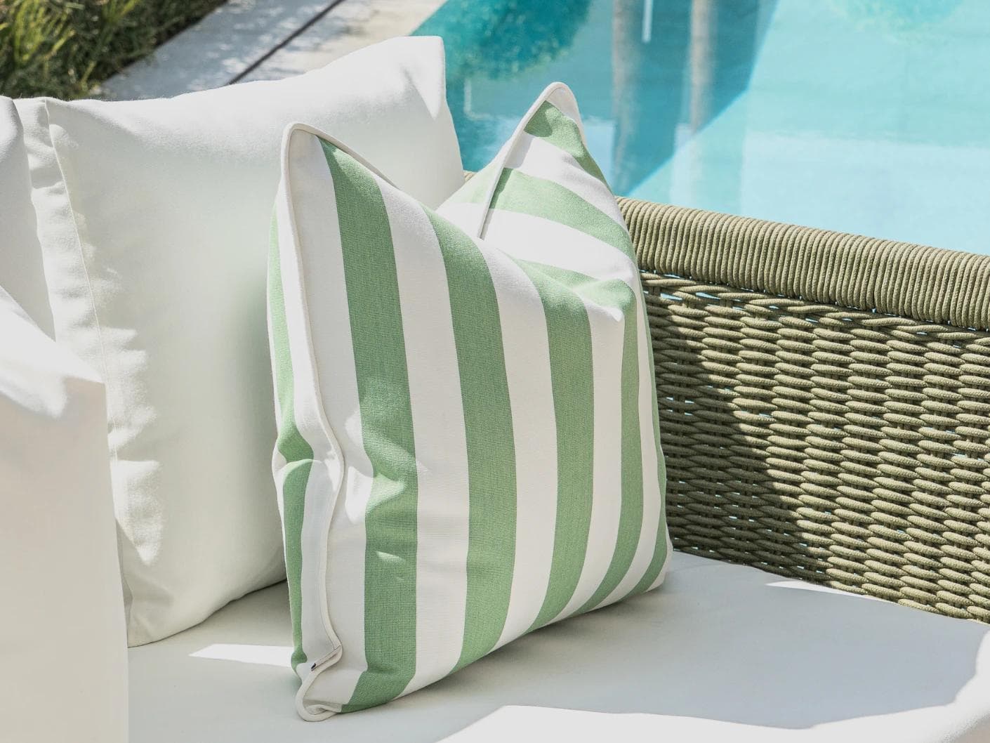 Mysha Bundle cushion in ivory and green, shown in a lifestyle left view as image 5
