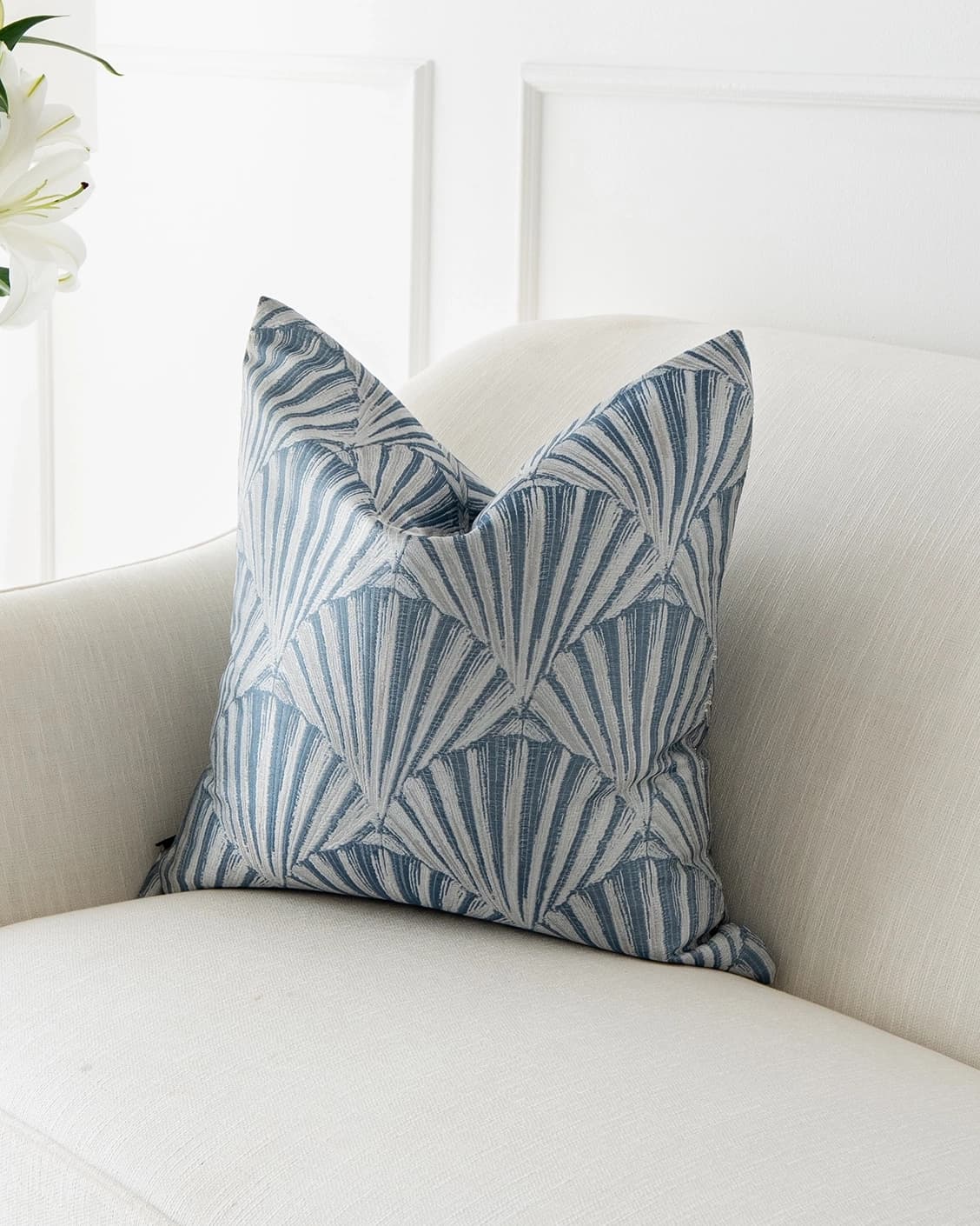 Ashlyn Canova cushion in blue and silver, shown in a lifestyle as image 2