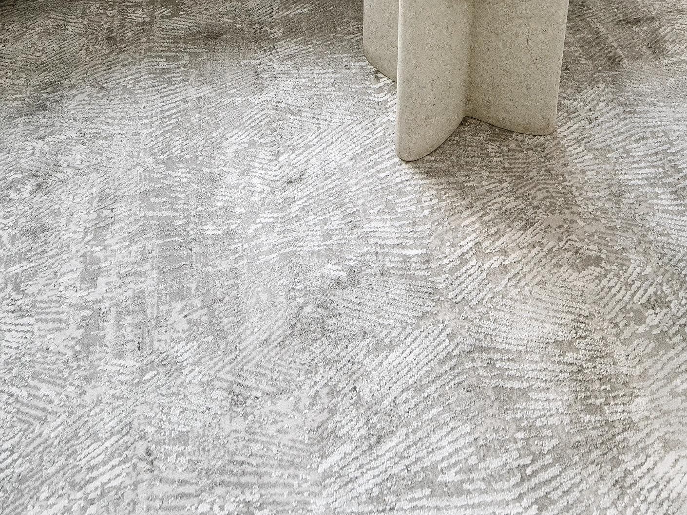 Athena Ashton carpets in grey and off white, shown in a lifestyle close-up as image 2