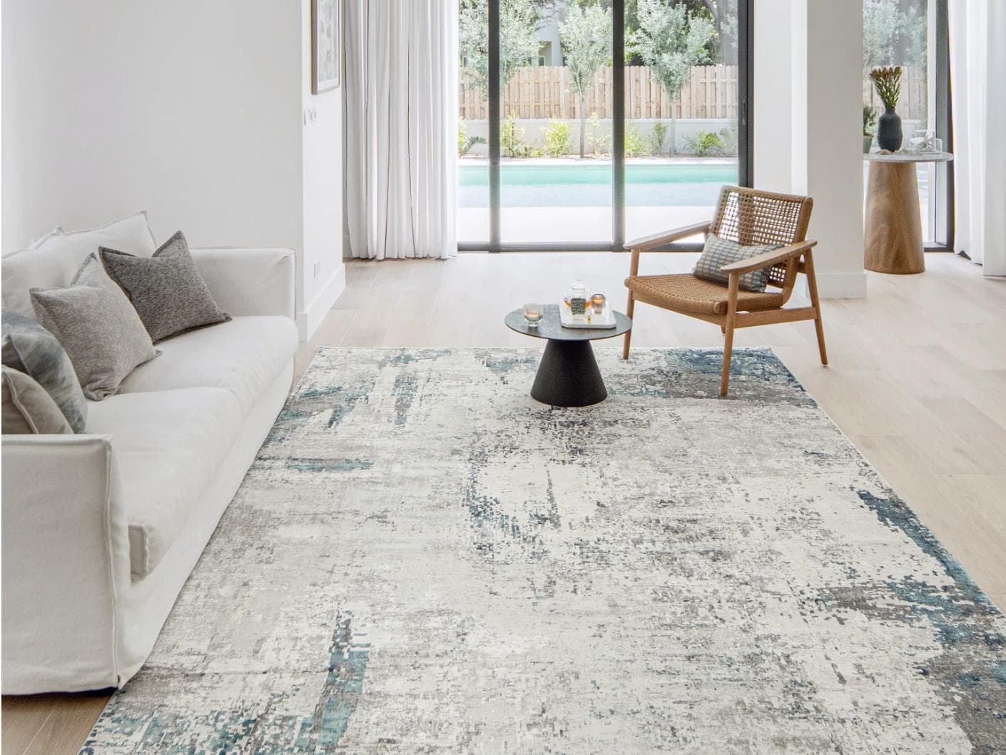 Athena Sky carpets in blue and grey, shown in a lifestyle front view as image 3
