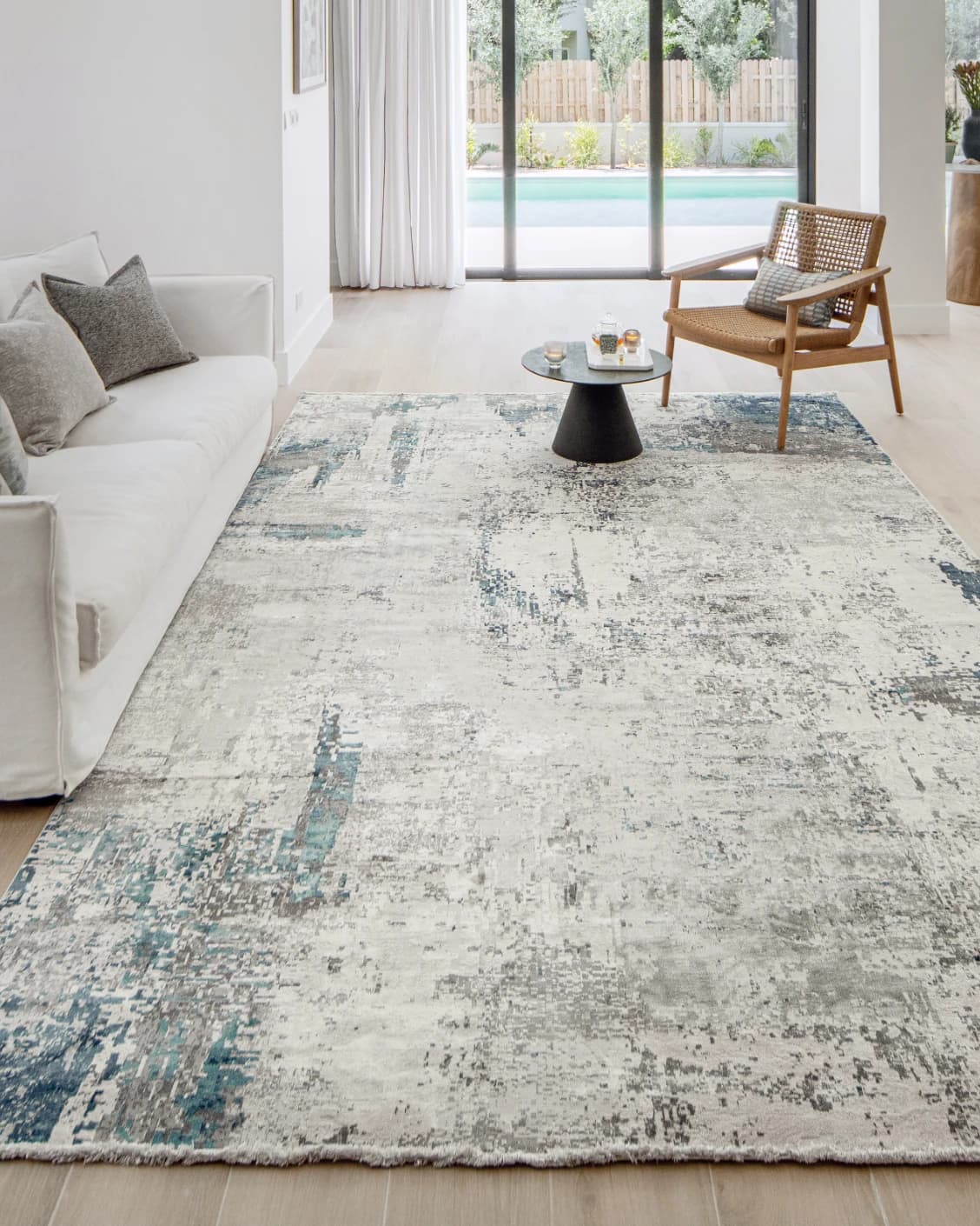 Athena Sky carpet in sky, blue and grey, shown in a lifestyle front view as image 5
