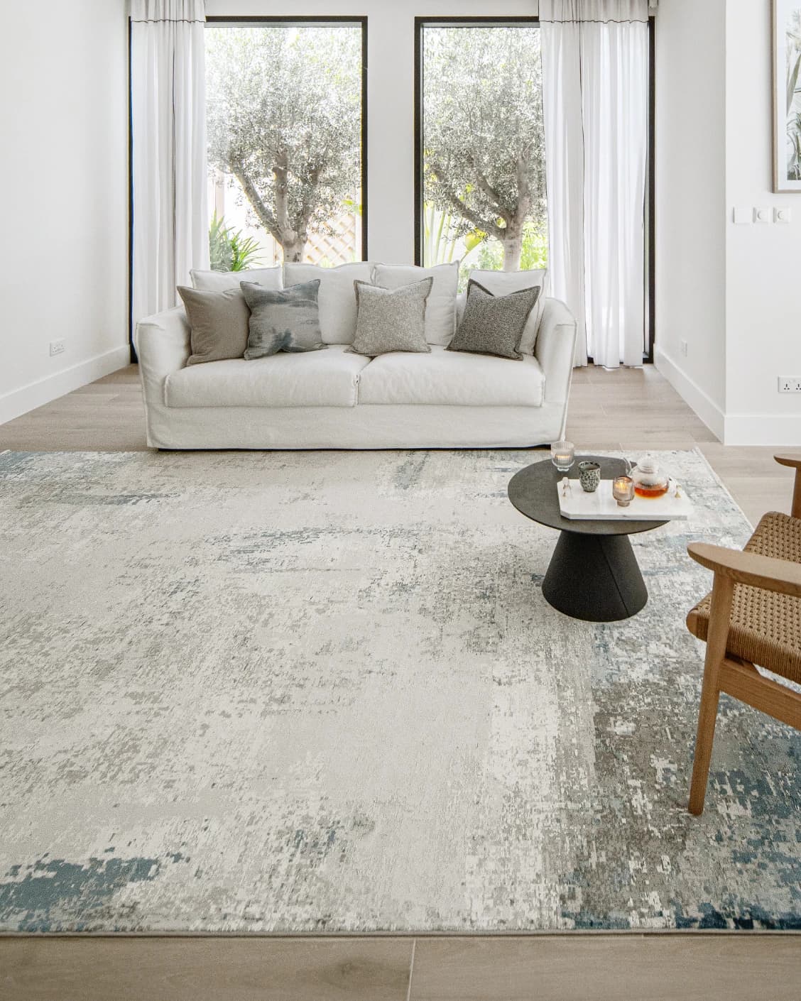 Athena Sky carpet in sky, blue and grey, shown in a lifestyle front view as image 6