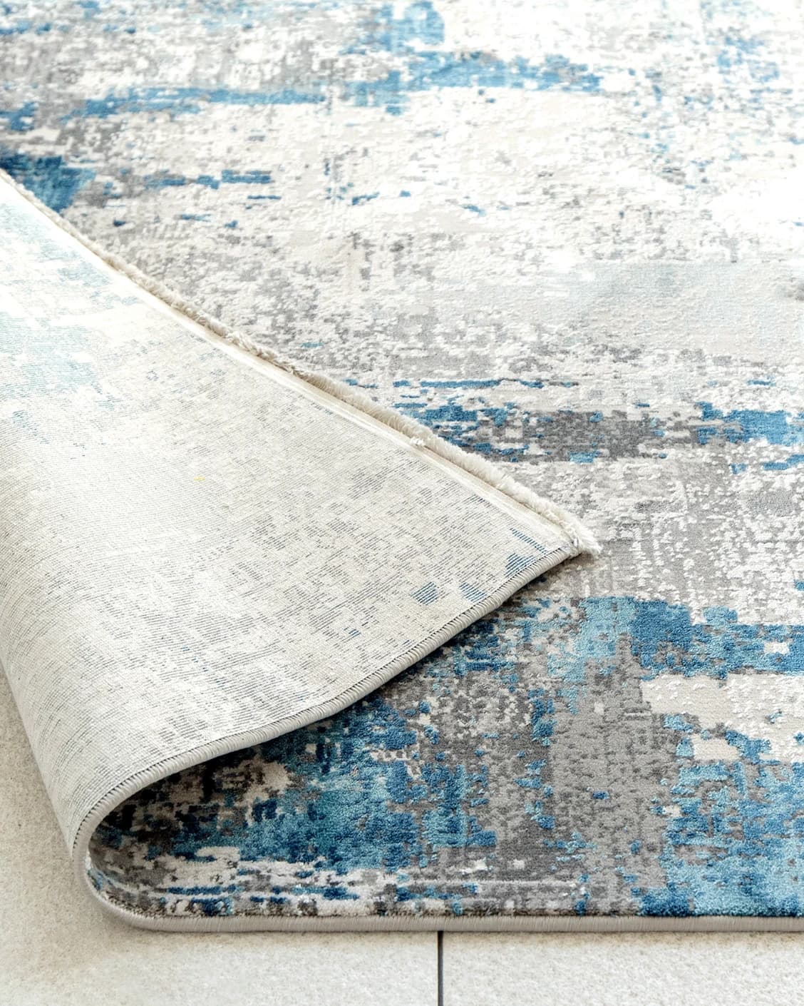 Athena Sky carpet in sky, blue and grey, shown in a product front view as image 12