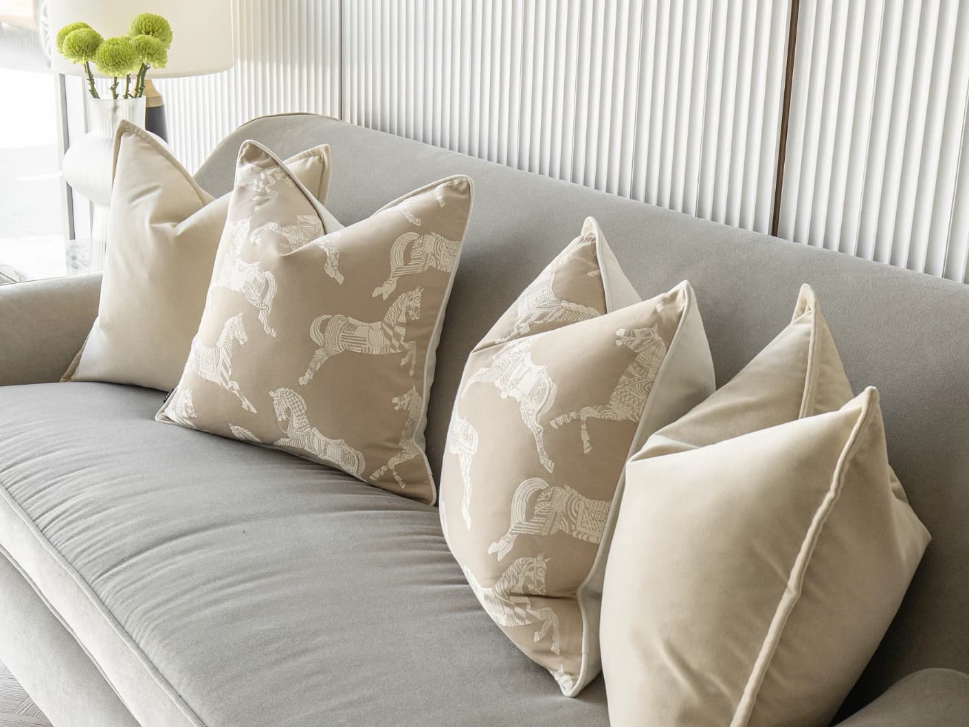 Aura Bundle bundle cushions in beige, shown in a lifestyle front view