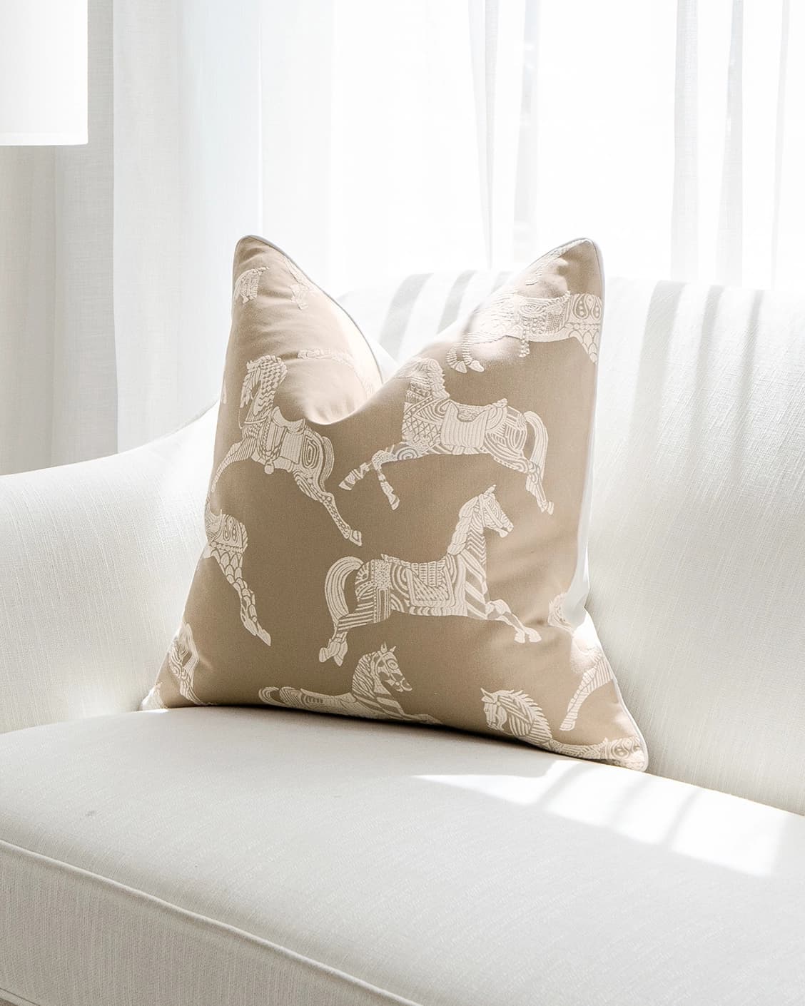 Aurora Hodler cushion in beige, shown in a lifestyle right view as image 2