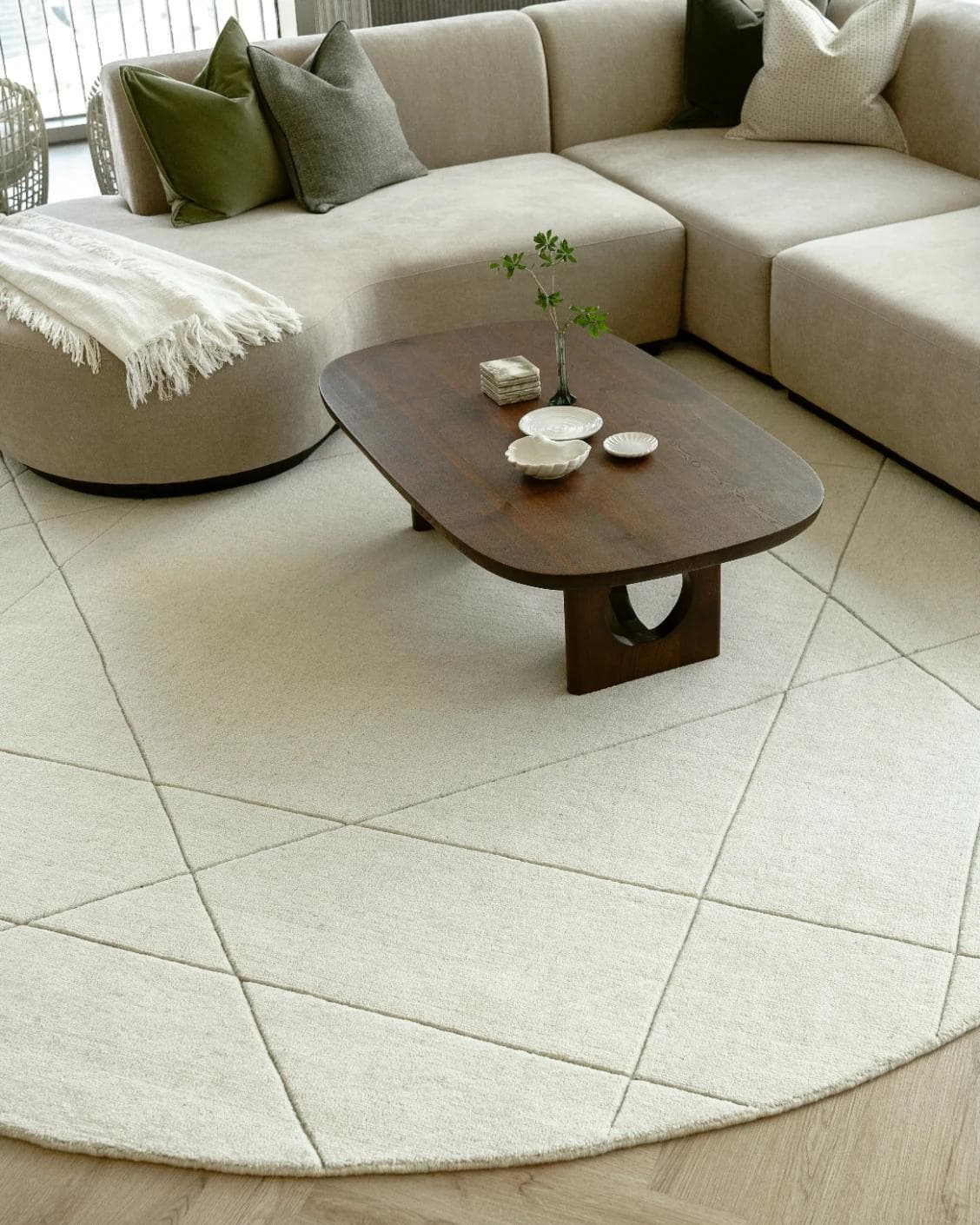 Axis Bianca Round carpet in beige, shown in a lifestyle front view as image 4