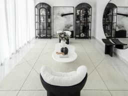 Axis Bianca carpet in beige, shown in a lifestyle front view