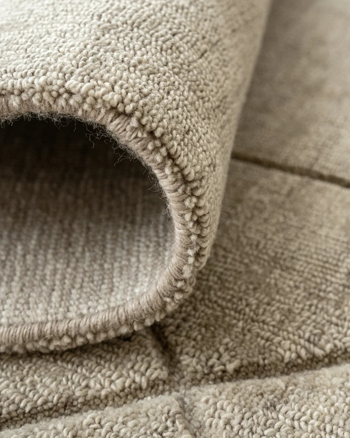 Axis Oat carpet in beige and brown, shown in a product close-up top view as image 10