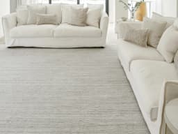 Beatrice Alba carpet in grey, shown in a lifestyle front view