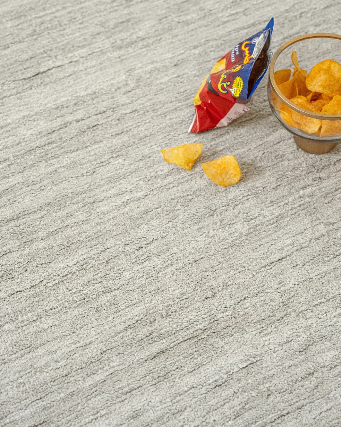 Beatrice Alba carpet in grey, shown in a lifestyle close-up as image 5