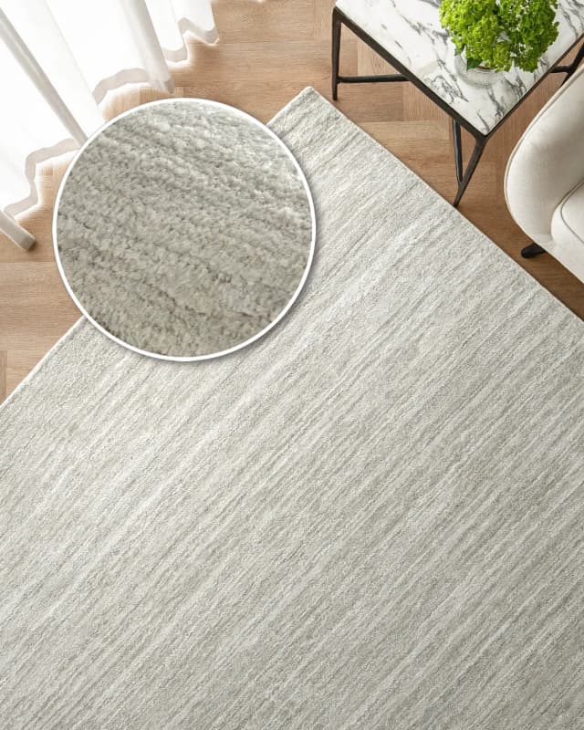 Beatrice Alba carpet in grey, shown in a lifestyle top view as image 2