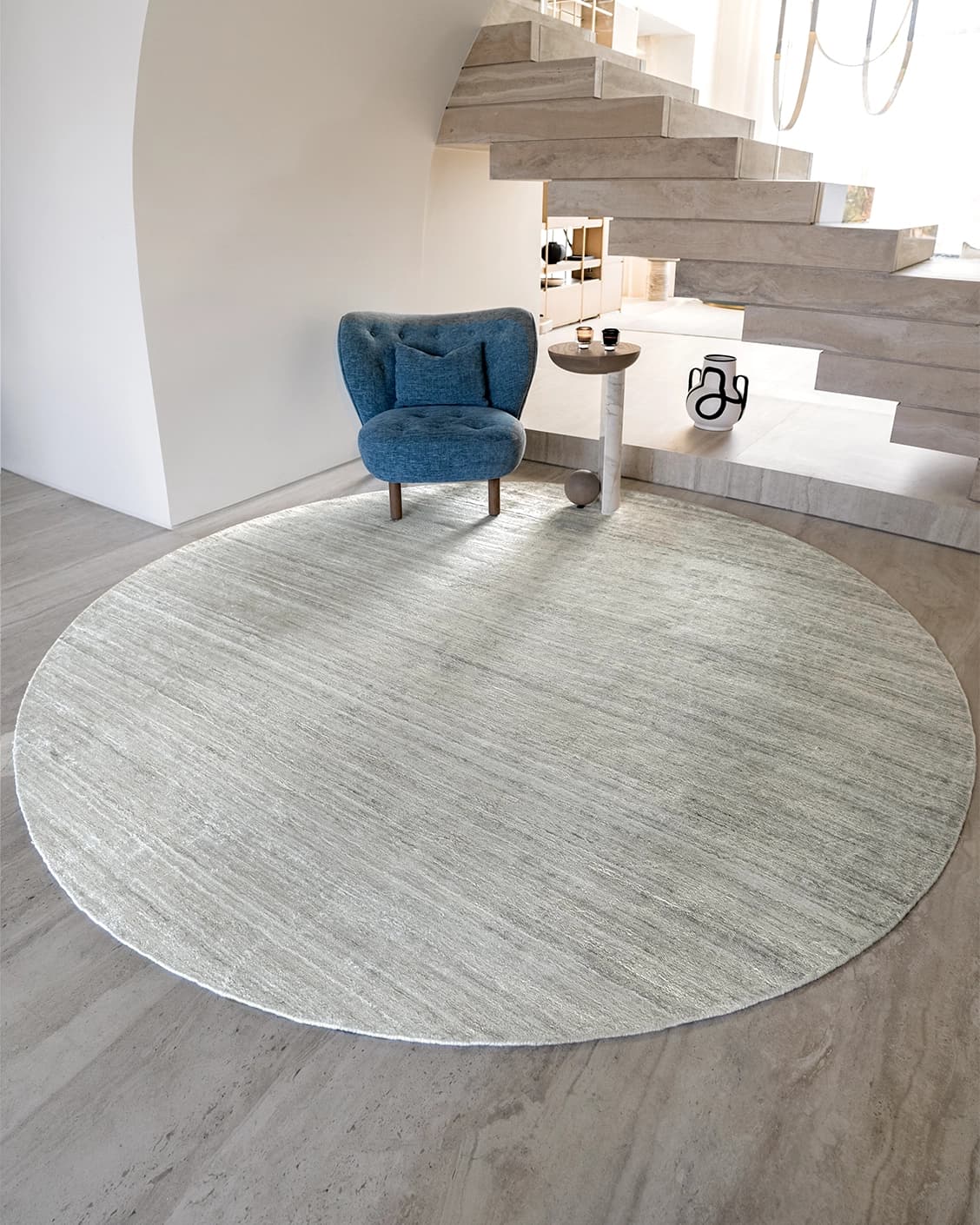 Beatrice Alba Round carpet in grey, shown in a lifestyle front view as image 2