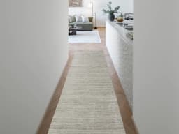 Beatrice Alba Runners carpet in grey, shown in a lifestyle front view