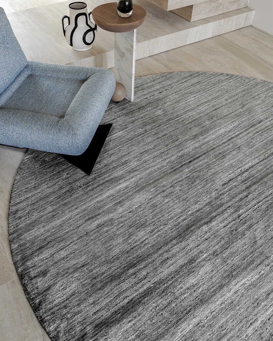 Beatrice Ashton Round carpet in grey, shown in a lifestyle front view as image 4