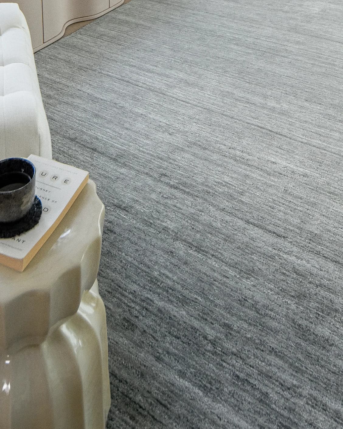Beatrice Ashton carpet in grey, shown in a lifestyle close-up top view as image 4