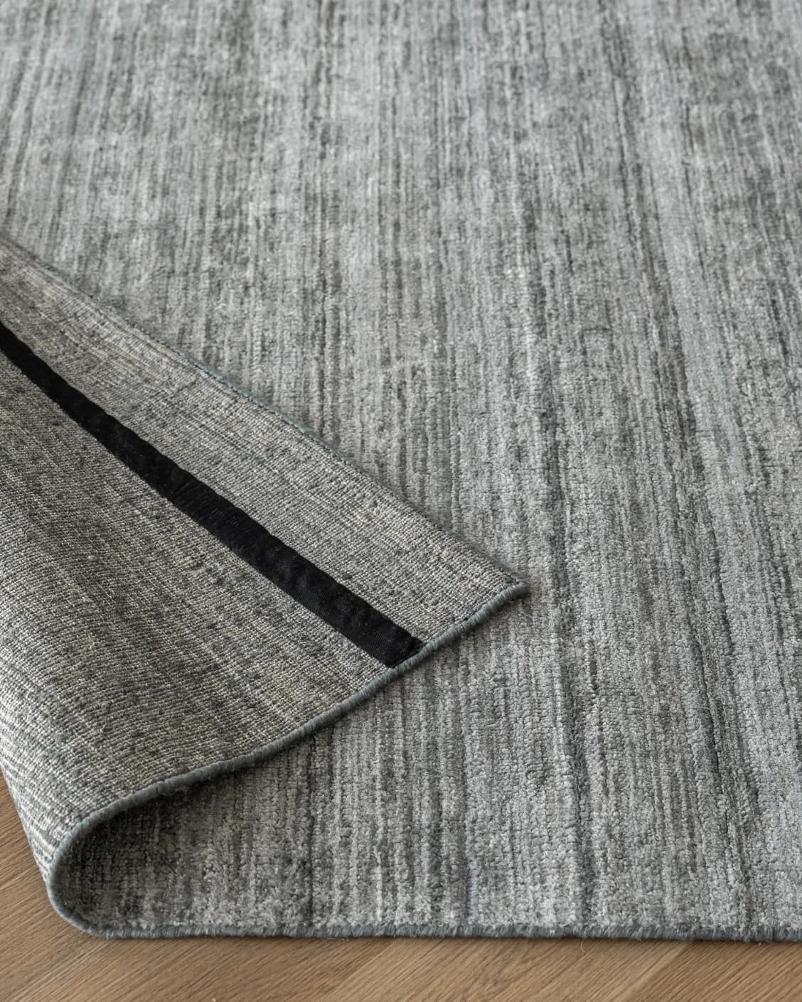 Beatrice Ashton carpet in grey, shown in a lifestyle front view as image 8
