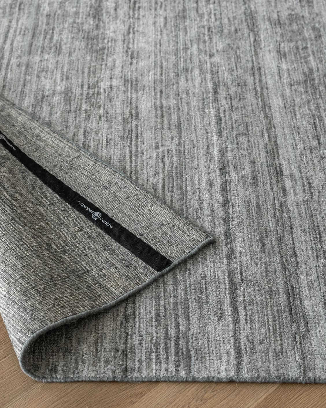 Beatrice Ashton carpet in grey, shown in a lifestyle front view as image 8