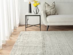 Beatrice Dune 01 carpet in dune and grey, shown in a lifestyle front view