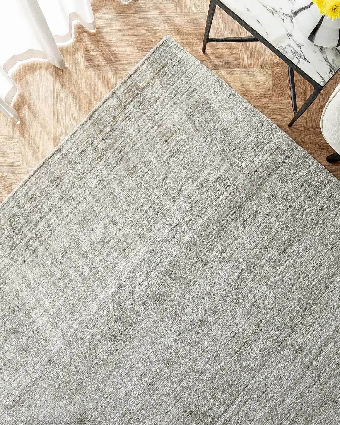 Beatrice Dune 02 carpet in dune and grey, shown in a lifestyle top view as image 2