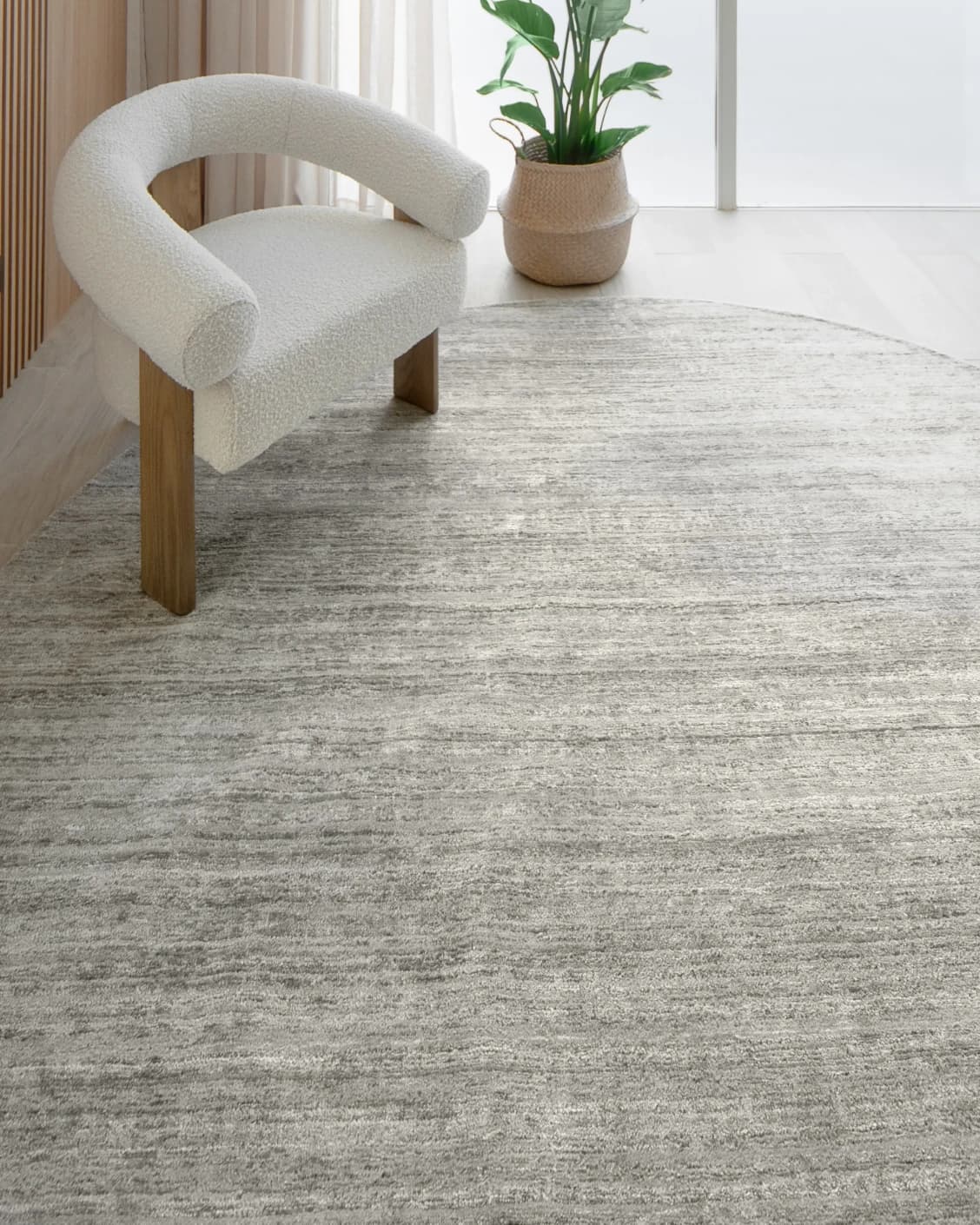 Beatrice Dune 02 Round carpet in dune and grey, shown in a lifestyle front view as image 4