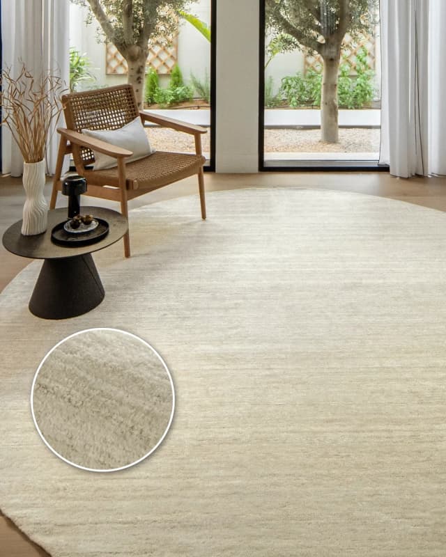 Beatrice Sandy 02 Round carpet in beige, shown in a lifestyle front view