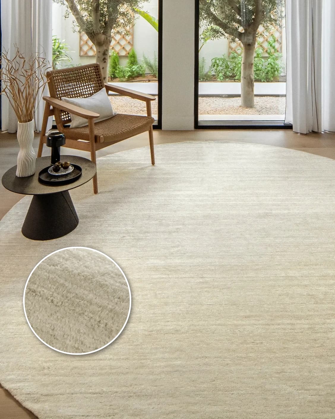 Beatrice Sandy 02 Round carpet in beige, shown in a lifestyle front view