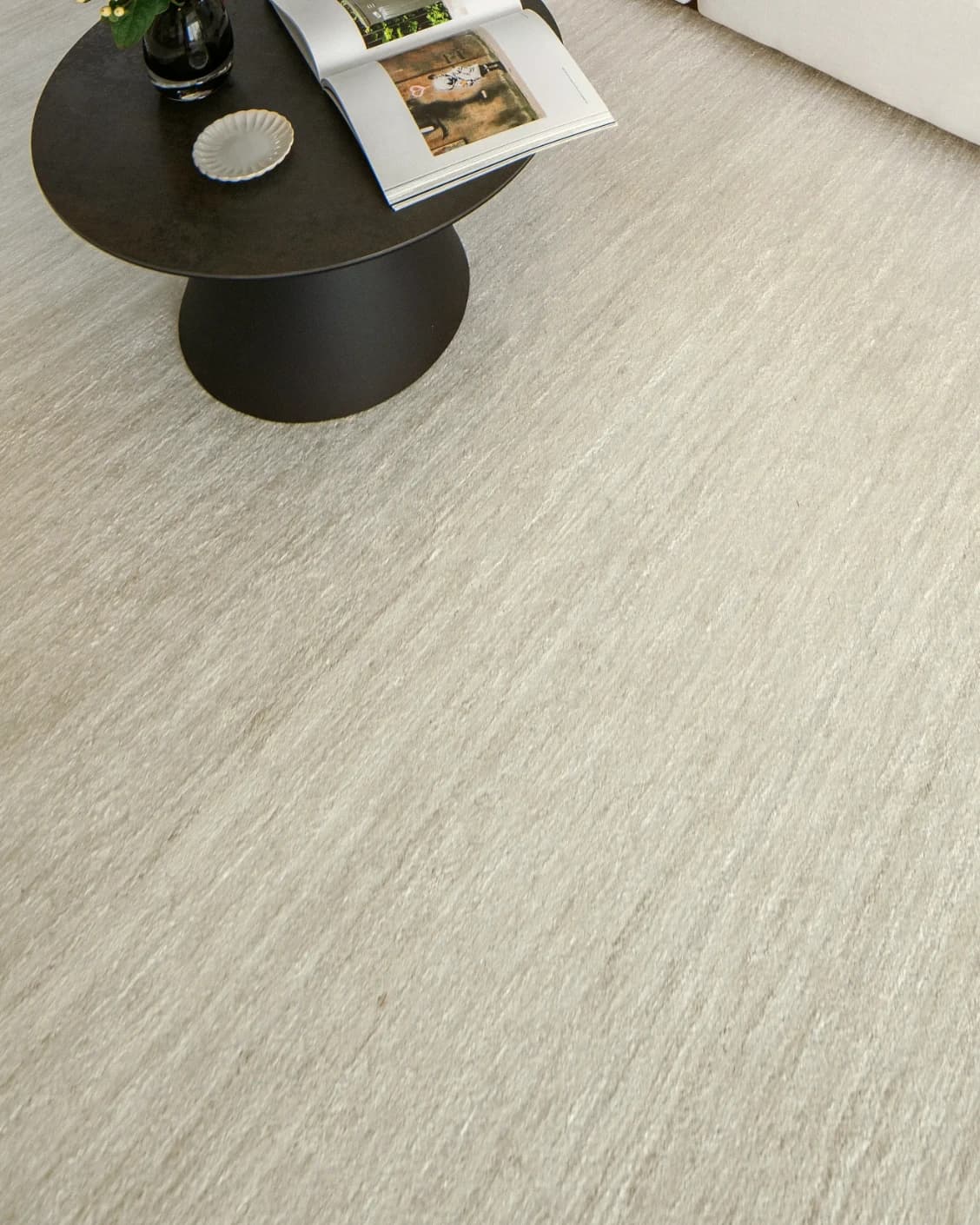 Beatrice Sandy 02 carpet in beige, shown in a lifestyle close-up top view as image 4