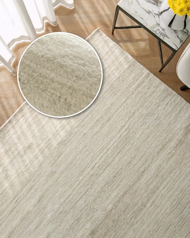 Beatrice Sandy 02 carpet in beige, shown in a lifestyle top view as image 2