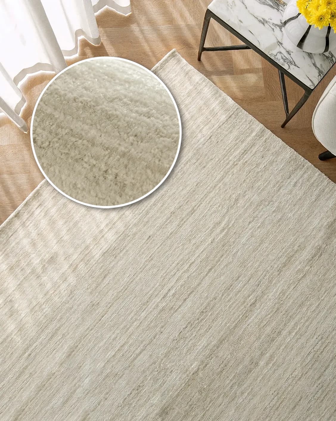 Beatrice Sandy 02 carpet in beige, shown in a lifestyle top view as image 2
