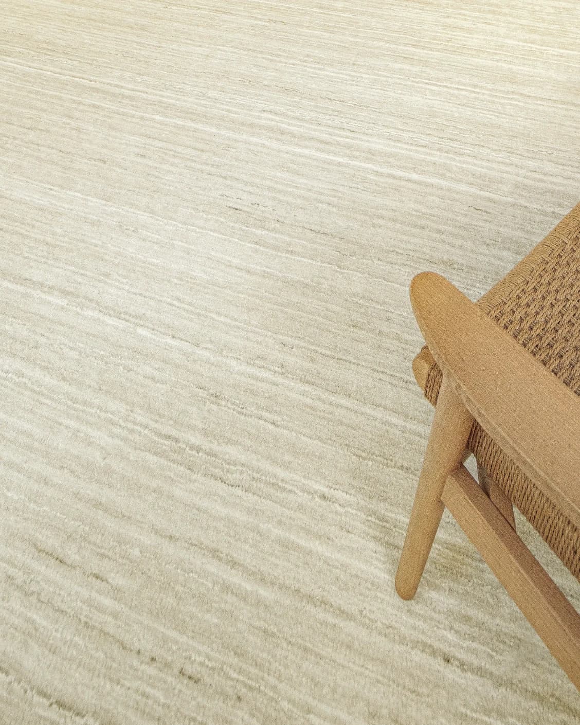 Beatrice Sandy 02 carpet in beige, shown in a lifestyle top view as image 11