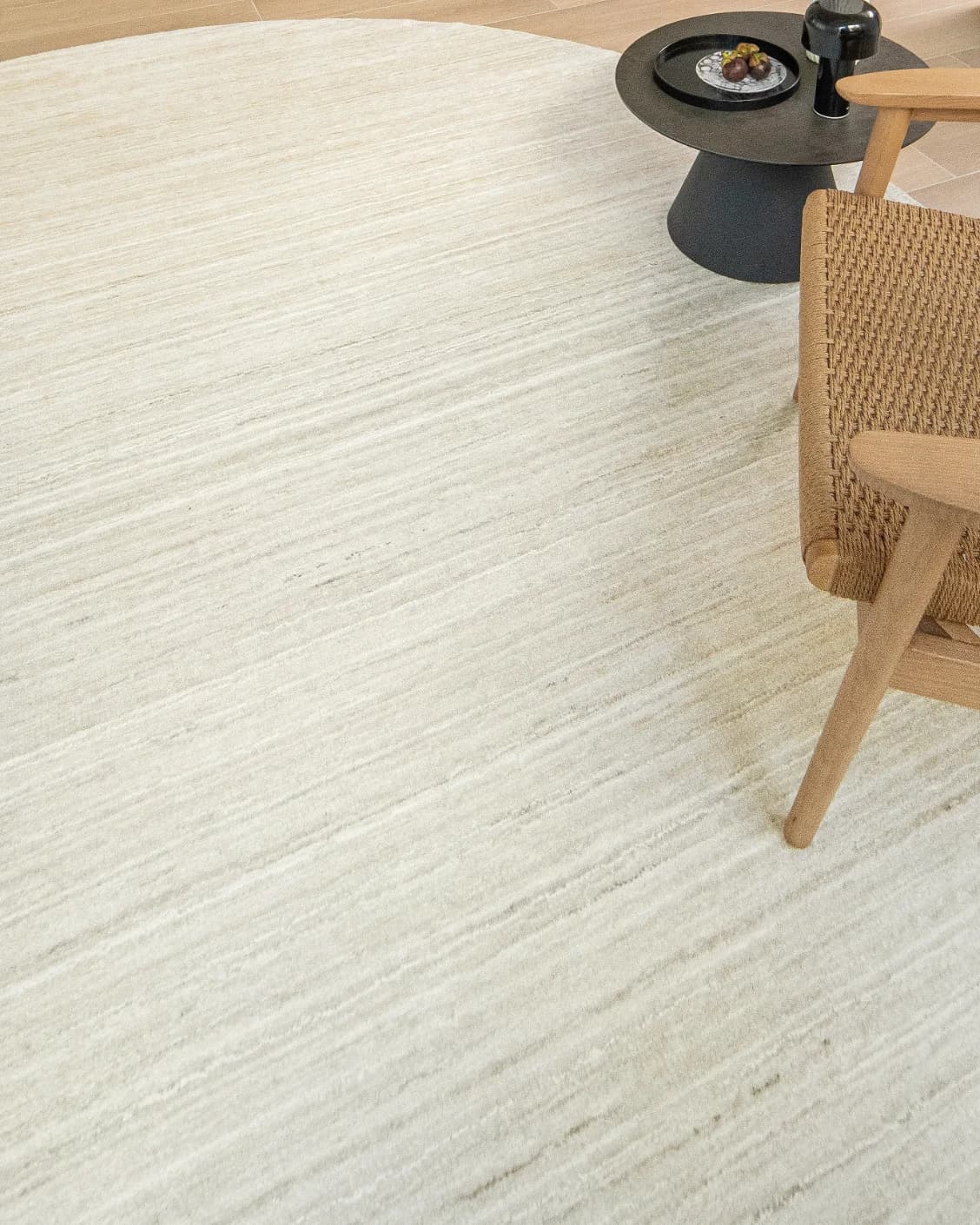 Beatrice Sandy 02 carpet in beige, shown in a lifestyle top view as image 12