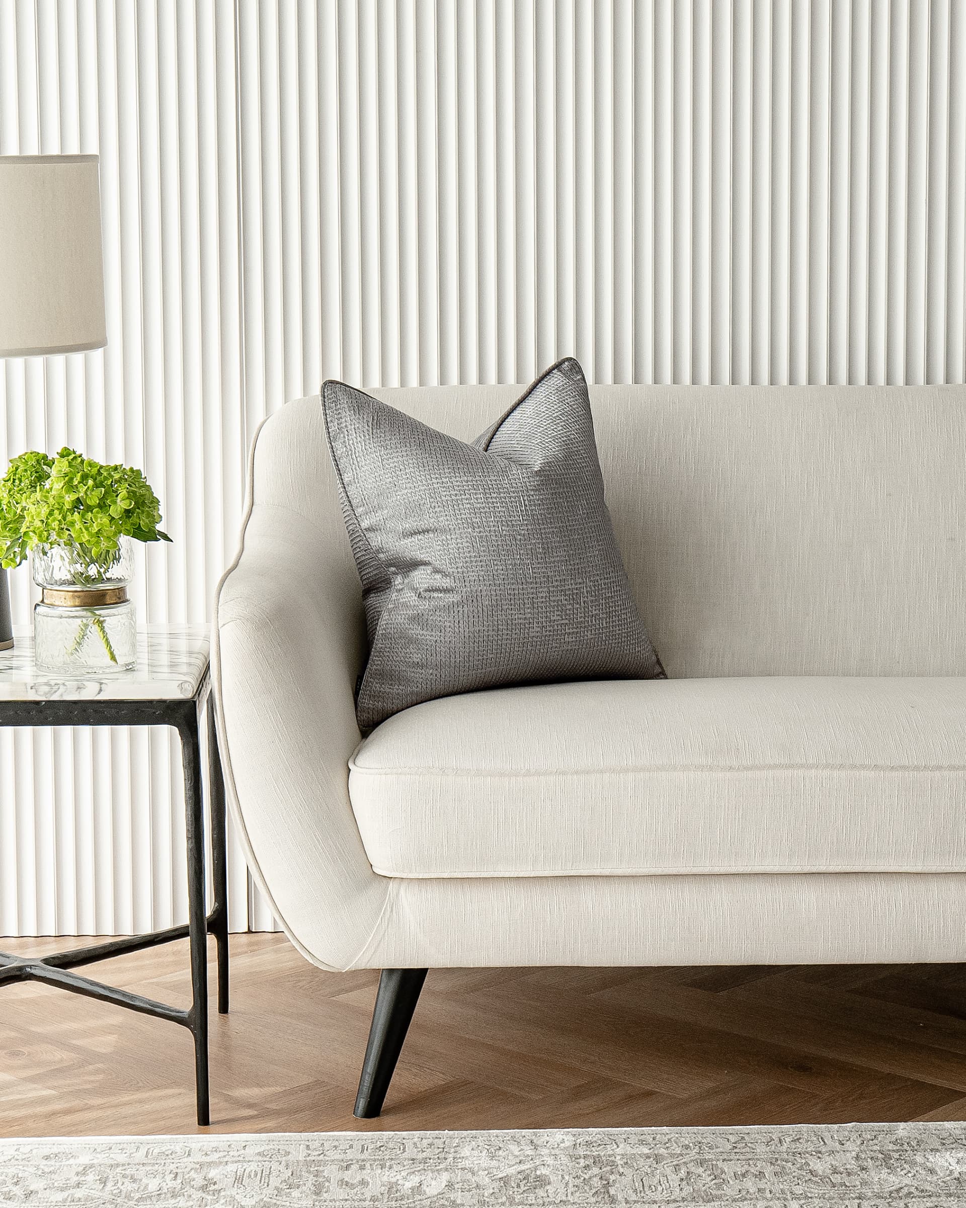 Benjamin Laurent cushion in silver and black, shown in a lifestyle close-up front view as image 4