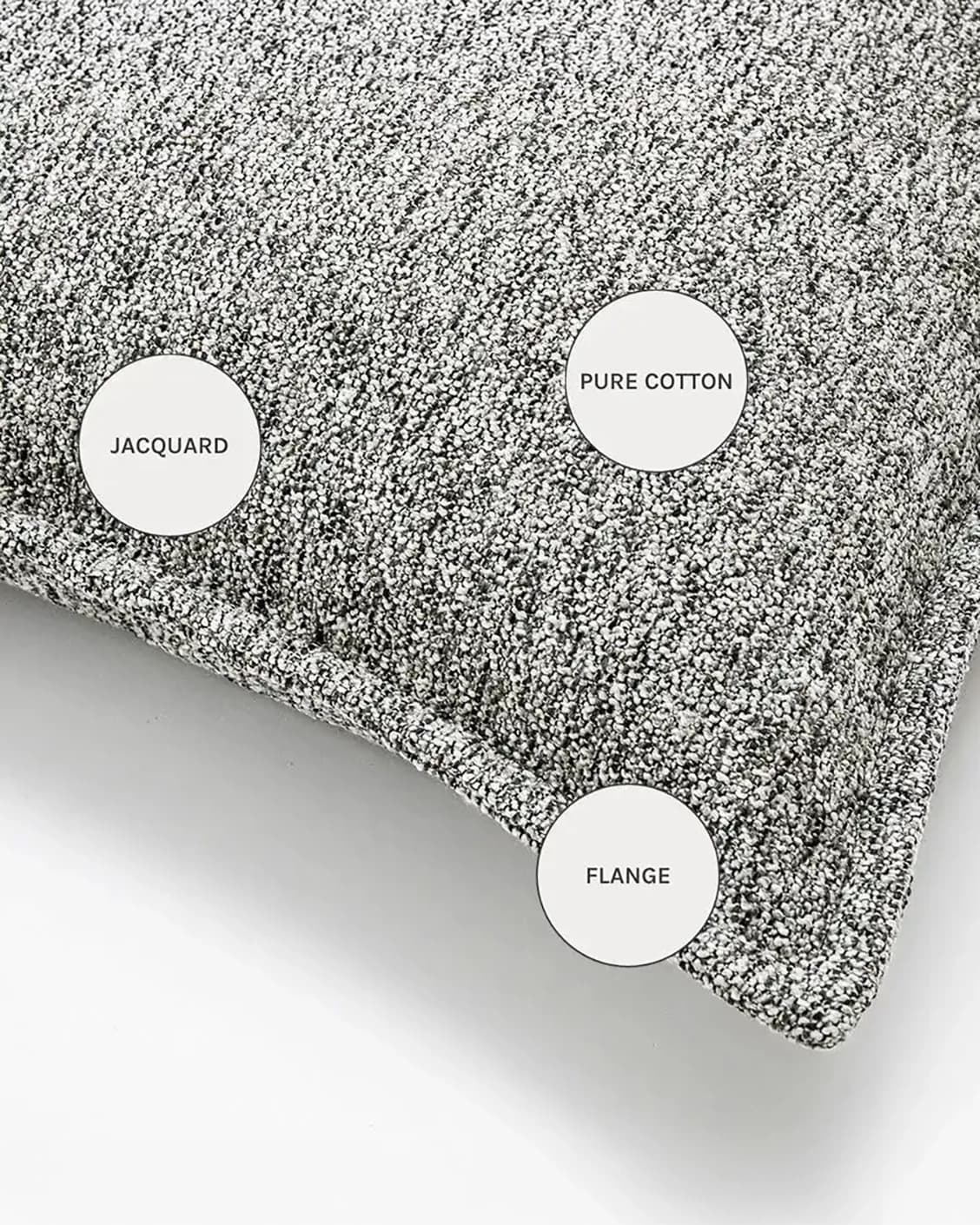 Bennett Steele cushion in silver and grey, shown in a lifestyle right view as image 2