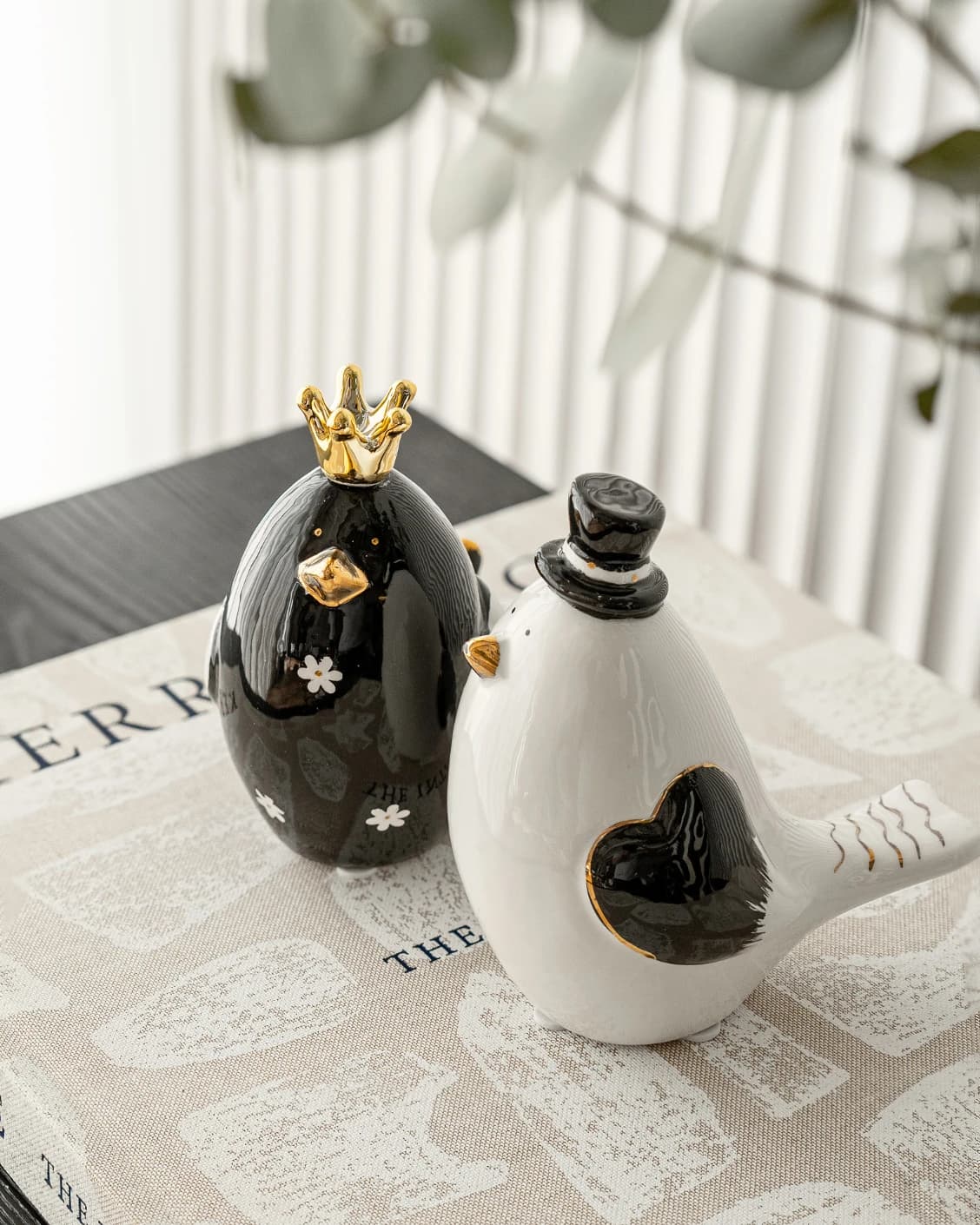Berdy Arneson statues and sculptures in gold, white and black, shown in a product front view as image 2