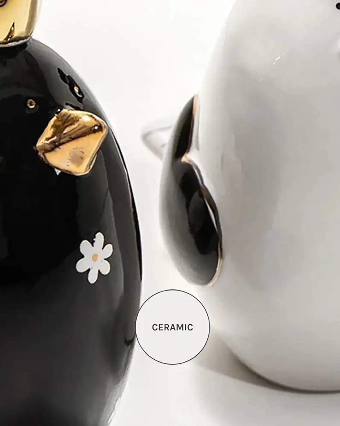 Berdy Arneson statues and sculptures in gold, white and black, shown in a product close-up back view as image 13