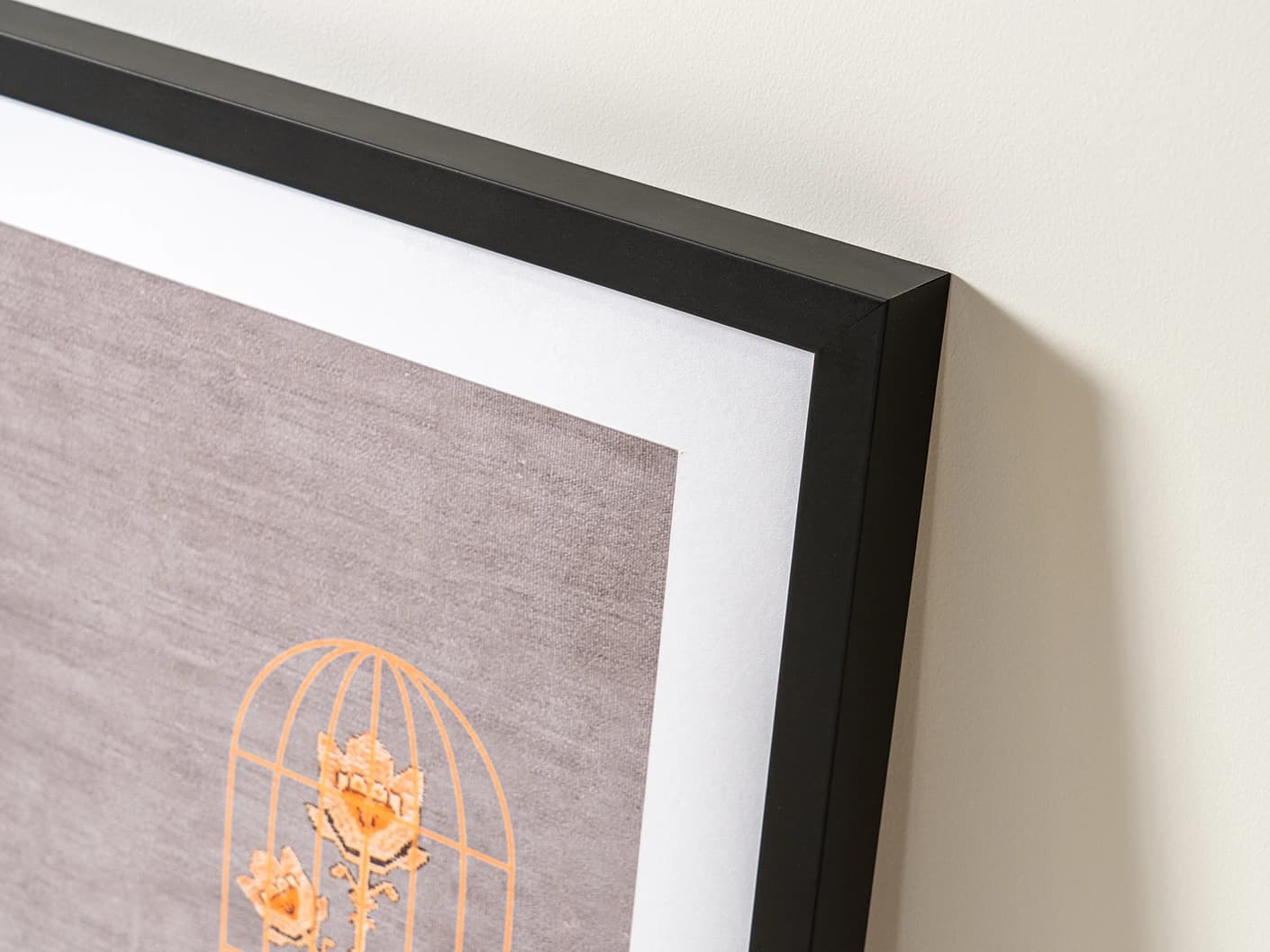 Bloom fine art print in orange and taupe, shown in a lifestyle close-up view as image 1