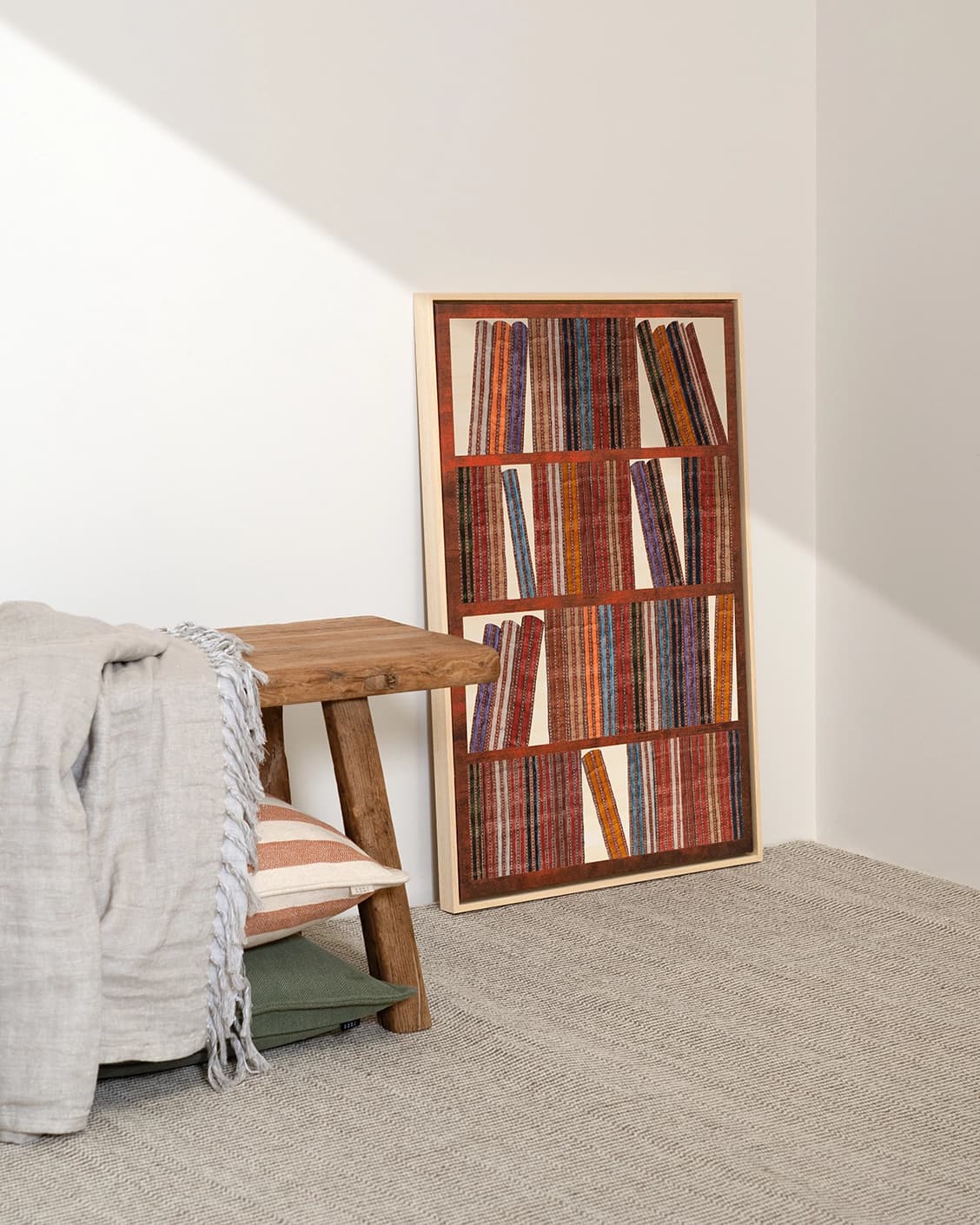 Books canvas in rust, blue and multicolour, shown in a lifestyle left view as image 2