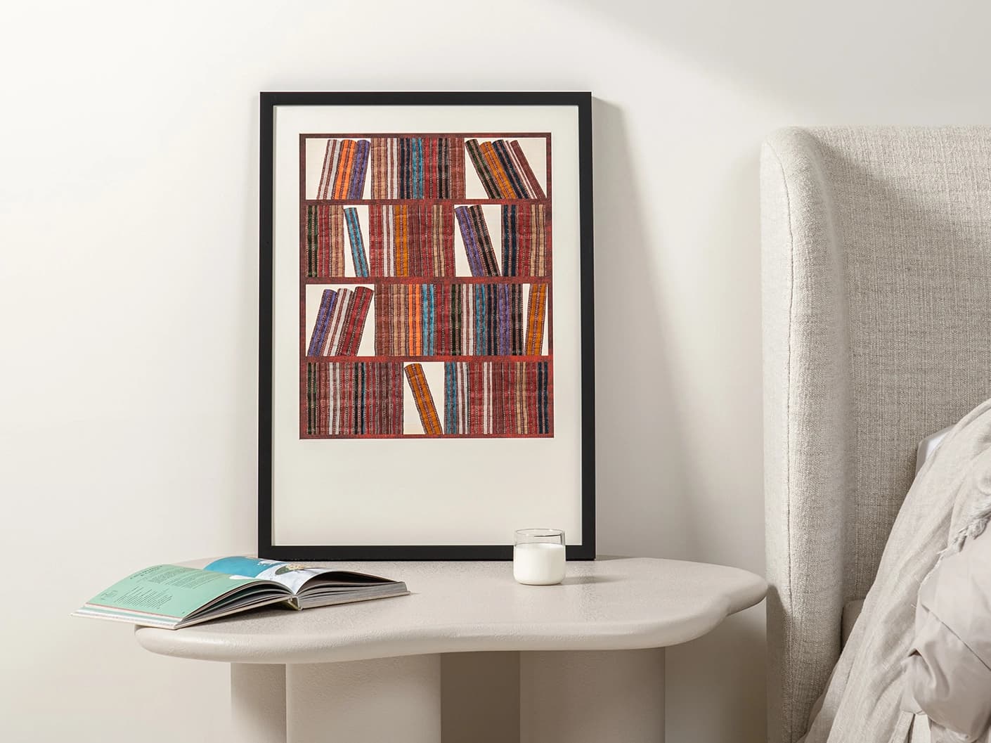 Books fine art print in rust, blue and multicolour, shown in a lifestyle front view as image 3