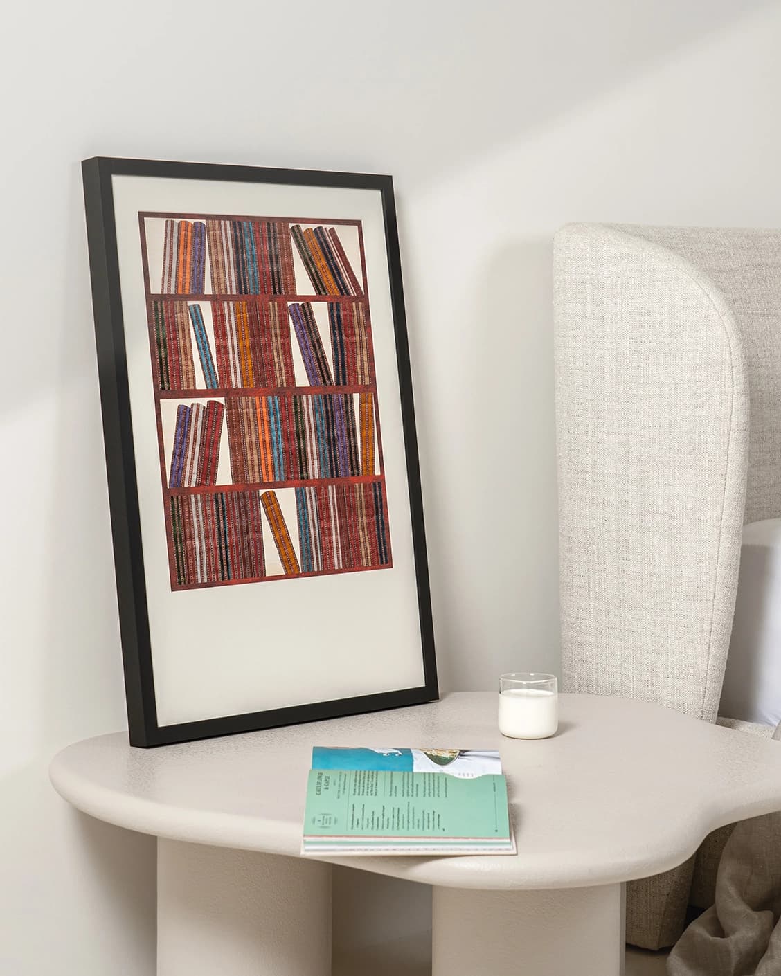 Books fine art print in rust, blue and multicolour, shown in a lifestyle left view as image 3