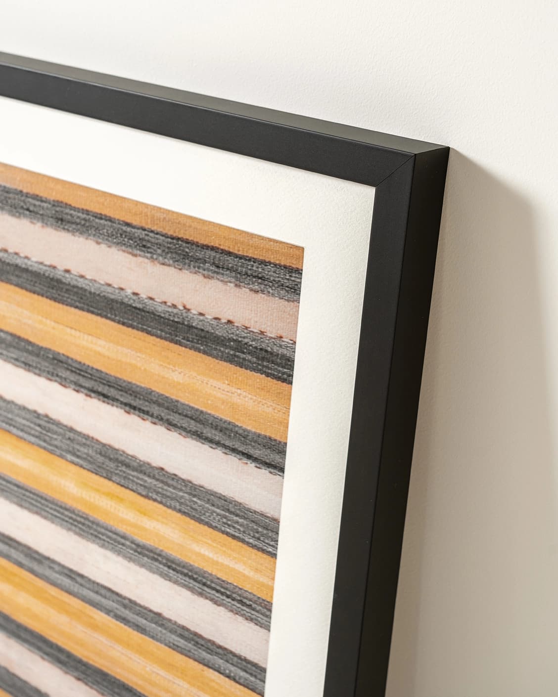 Bumblebee Gray fine art print in grey, beige and yellow, shown in a lifestyle close-up view as image 4