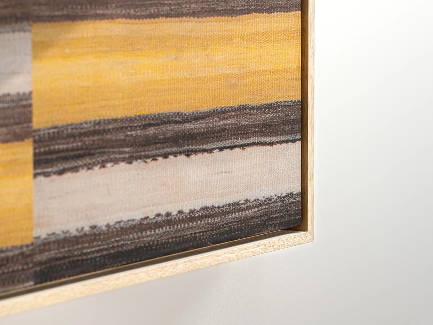 Bumblebee canvas in brown, beige and yellow, shown in a lifestyle close-up as image 1