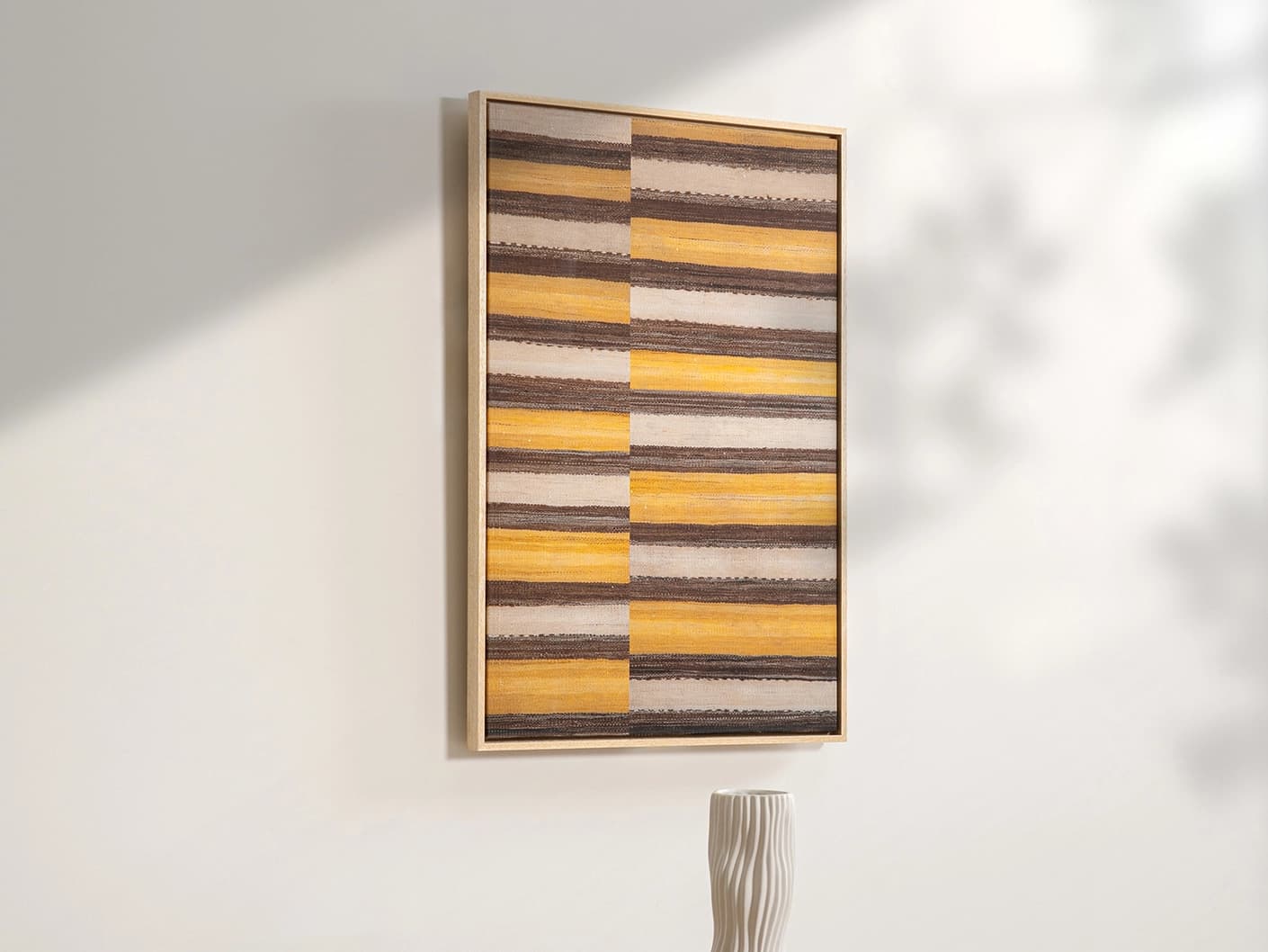 Bumblebee canvas artwork in brown, beige and yellow, shown in a lifestyle left view