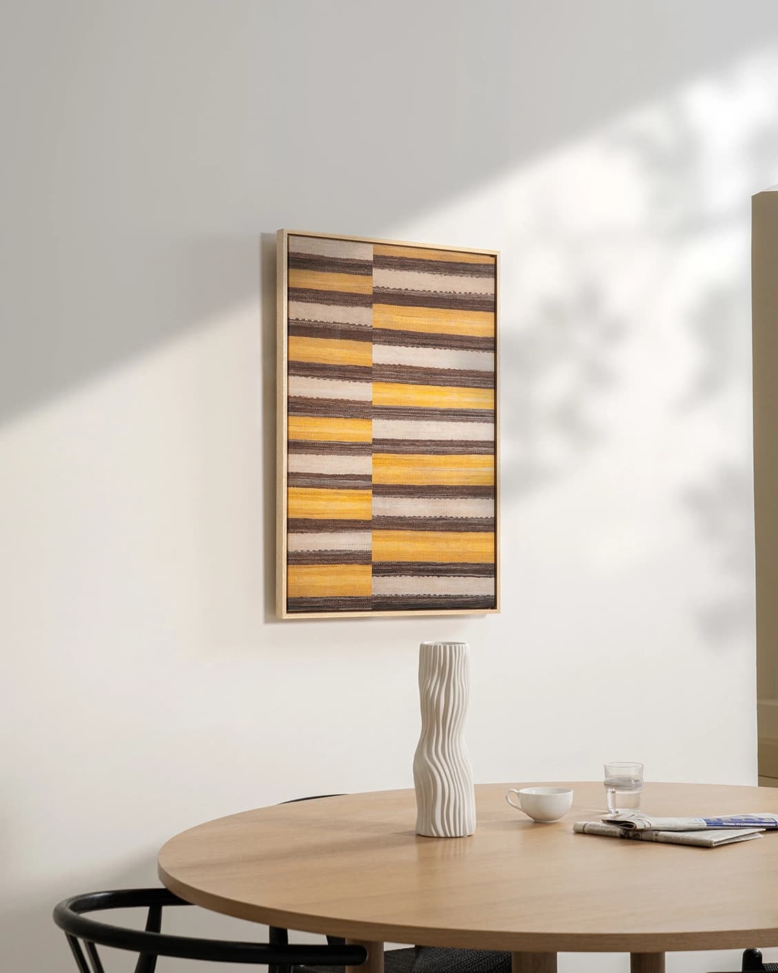 Bumblebee canvas in brown, beige and yellow, shown in a lifestyle left view as image 2