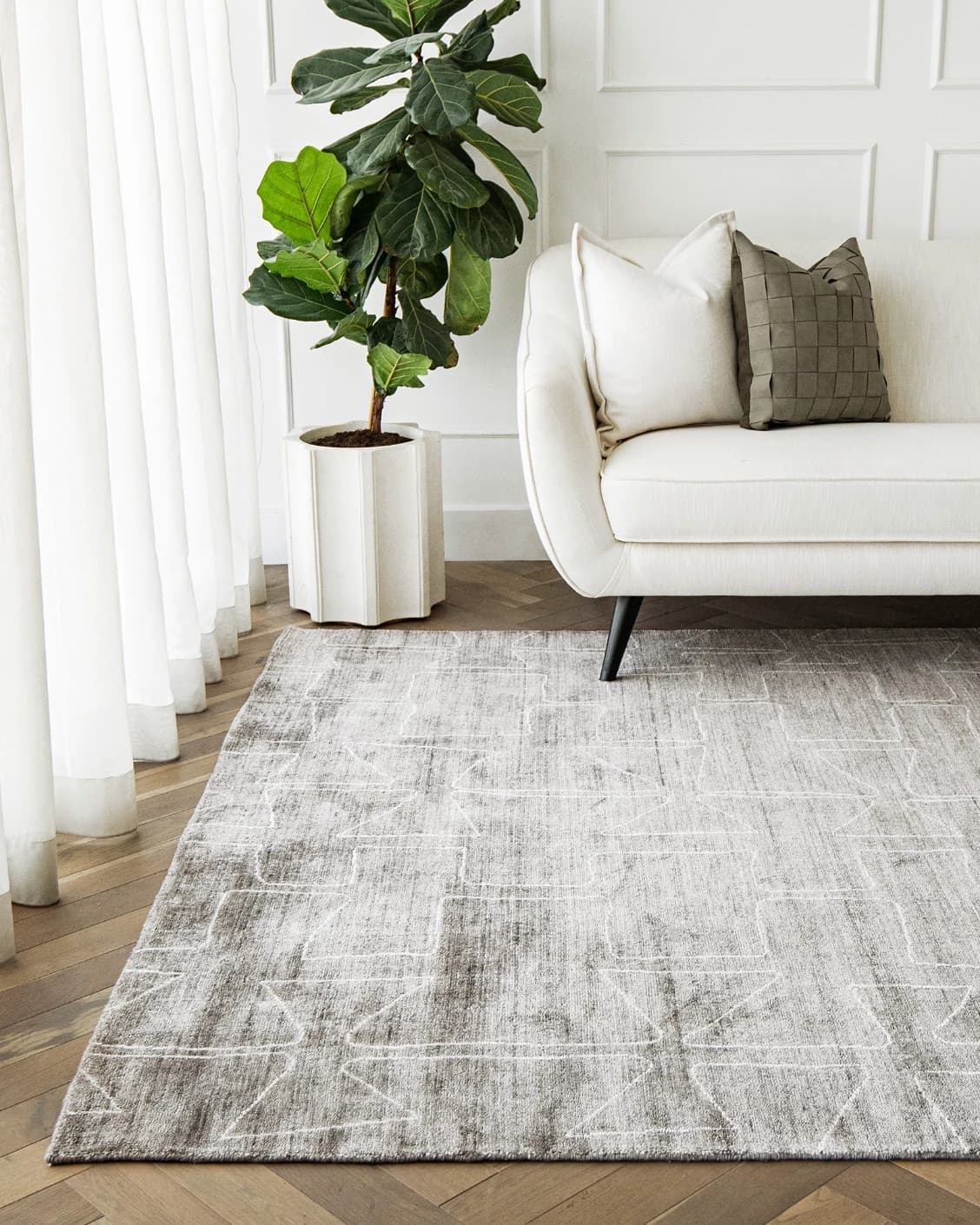 Caleb Dune carpet in grey and blue, shown in a lifestyle front view as image 4