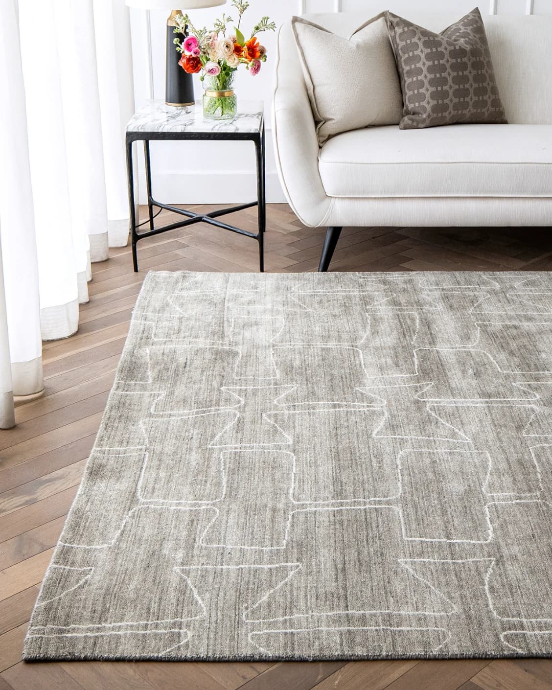 Caleb Dune carpet in grey and blue, shown in a lifestyle front view as image 5