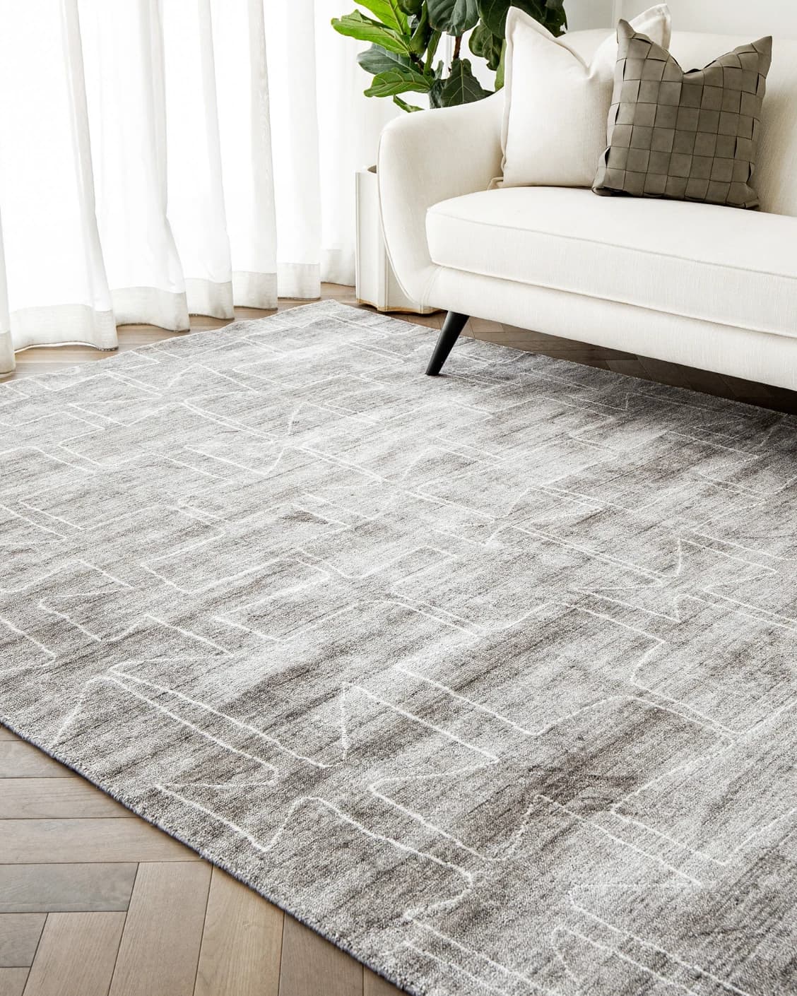 Caleb Dune carpet in grey and blue, shown in a lifestyle right view as image 6