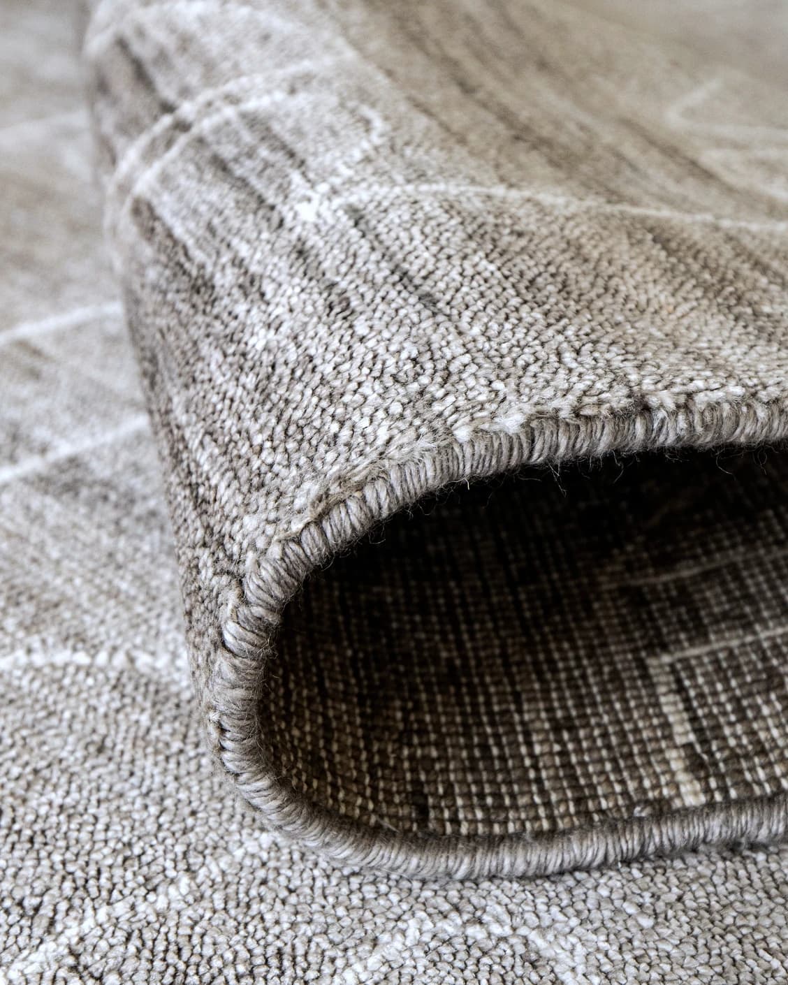 Caleb Dune carpet in grey and blue, shown in a product close-up as image 8