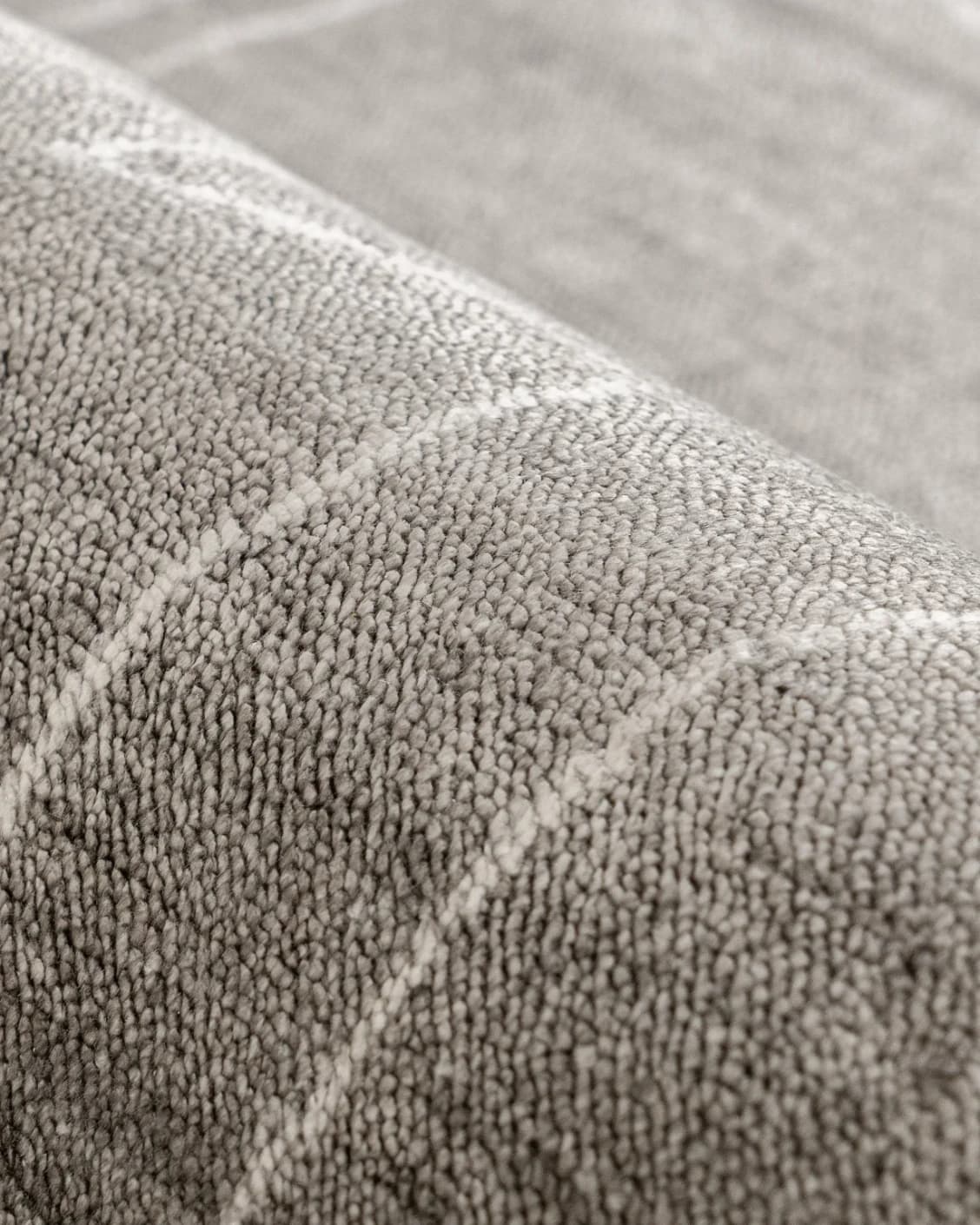 Caleb Dune carpet in grey and blue, shown in a product close-up as image 9