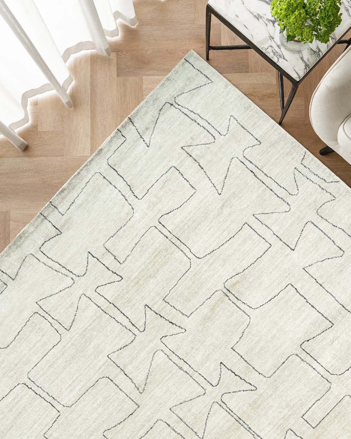 Caleb Ebony carpet in ebony, pearl and grey, shown in a lifestyle top view as image 2
